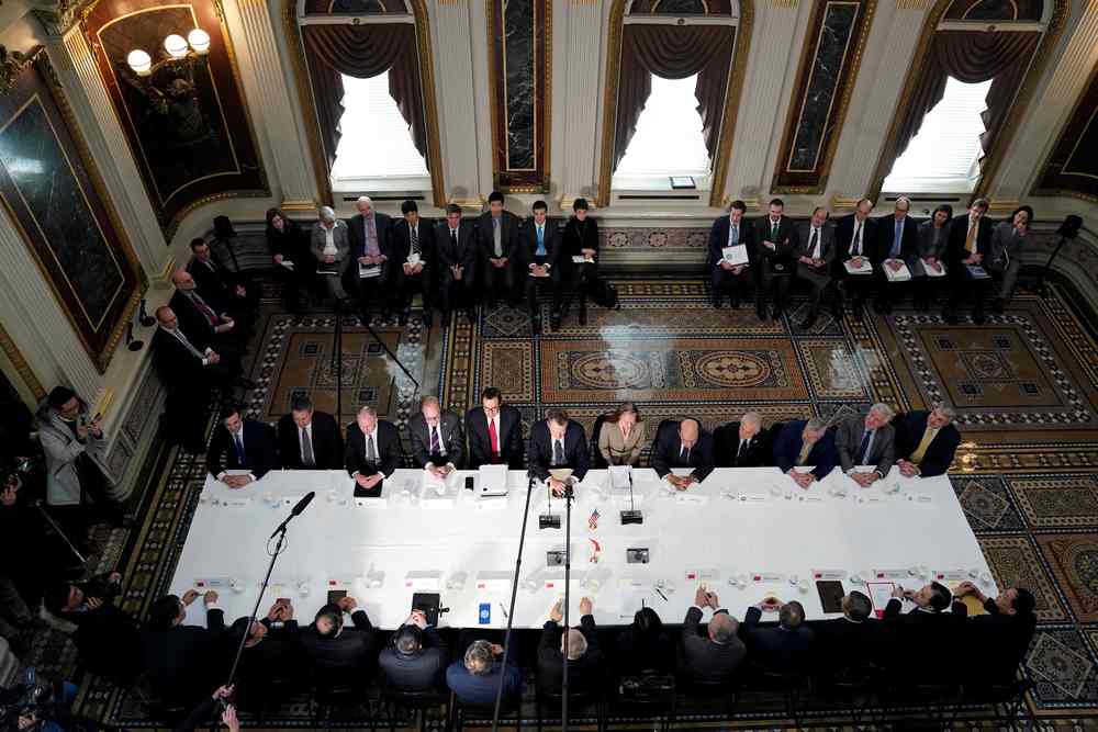 Top US and China officials pose for a photograph before the start of US-China trade talks at the White House in Washington February 21, 2019. u00e2u20acu201d Reuters pic
