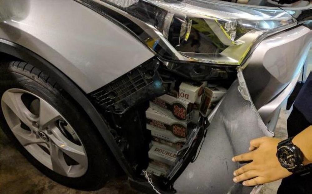 144 cartons and 1,143 packets of duty-unpaid cigarettes were found in the car Law was driving. u00e2u20acu201d Handout via TODAY