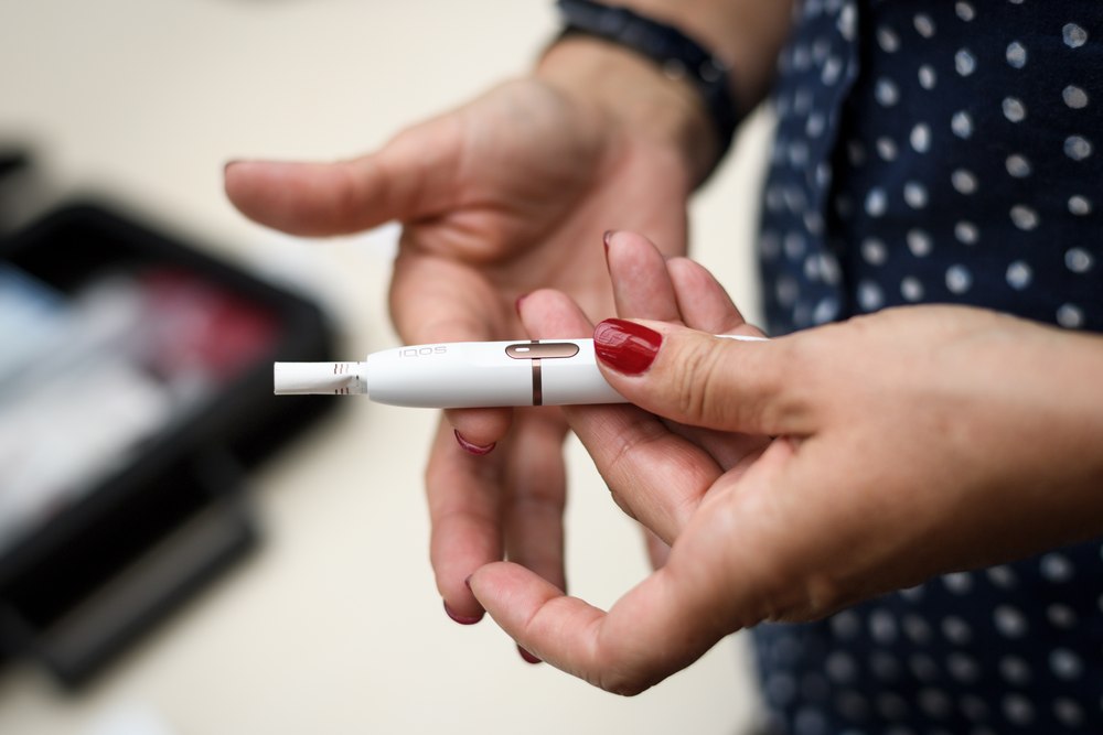 An iQOS electronic cigarette, which heats tobacco sticks but does not burn them, is shown at Philip Morris International's research and development campus in Neuchatel, Switzerland on August 21, 2018. u00e2u20acu201d AFP pic