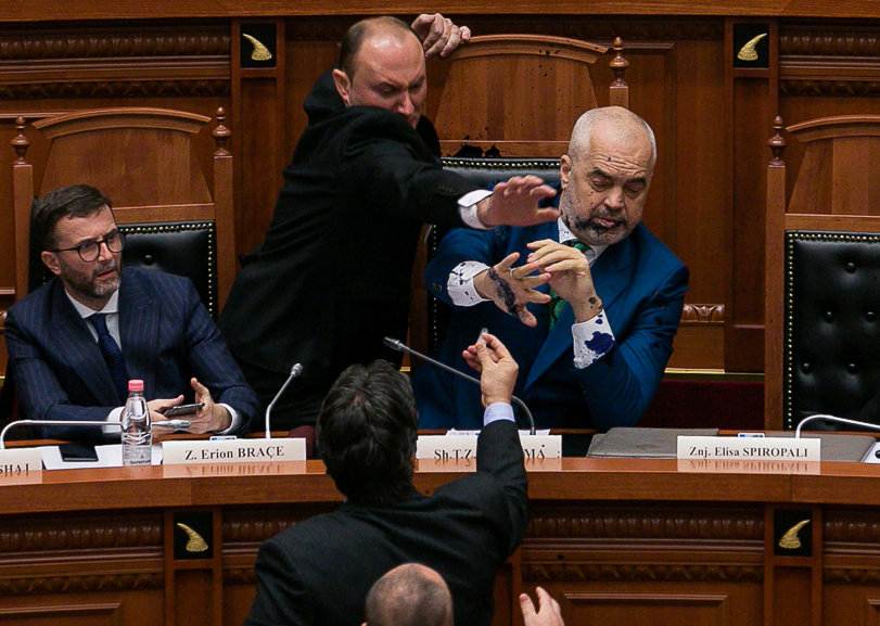 Albania's Prime Minister Edi Rama reacts as ink is thrown at him by members of the opposition during parliamentary session in Tirana February 14, 2019. u00e2u20acu201d Reuters pic