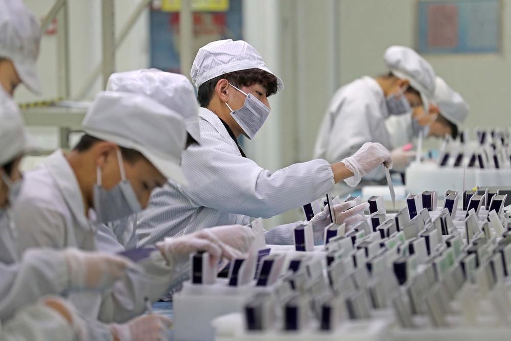 Workers at a production line manufacturing solar photovoltaic components at a factory in Huzhou, Zhejiang province, China February 12, 2019. u00e2u20acu201d Lin Yunlong/Zhejiang Daily pic via Reuters