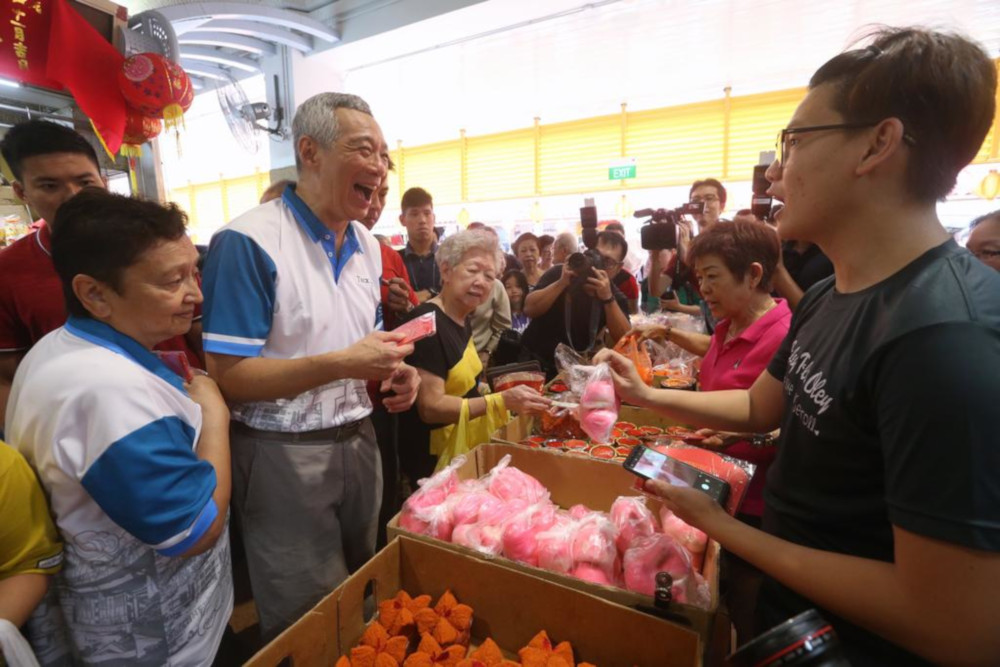 Prime Minister Lee Hsien Loong visited the Market and Food Centre at Blk 341 in Teck Ghee, Ang Mo Kio, on February 3, 2019, to interact with residents, exchange festive greetings and distribute red packets. u00e2u20acu201d TODAY pic 