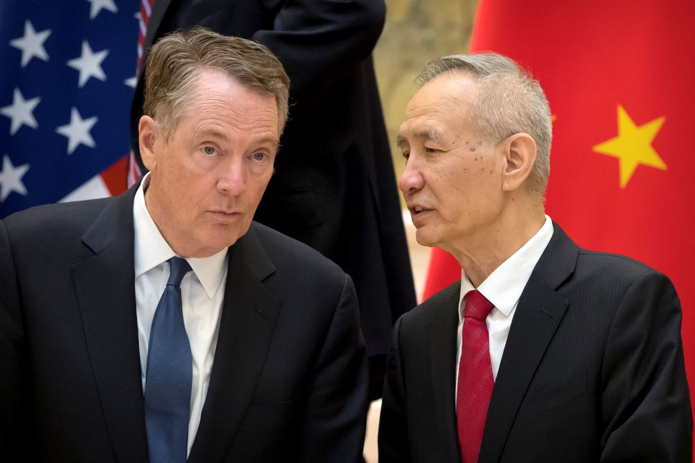 US Trade Representative Robert Lighthizer (left) listens as Chinese Vice Premier Liu He talks while they line up for a group photo at the Diaoyutai State Guesthouse in Beijing February 15, 2019 u00e2u20acu201d Reuters pic 
