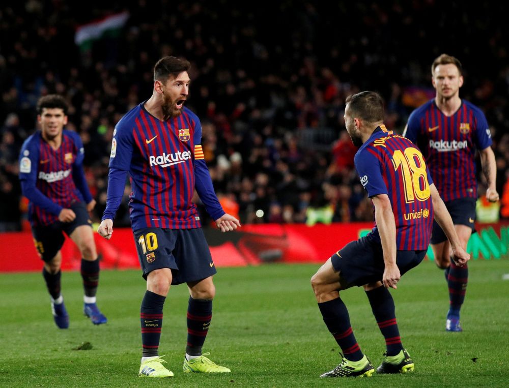 Barcelona's Lionel Messi celebrates scoring their second goal with Jordi Alba. u00e2u20acu201d Reuters pic