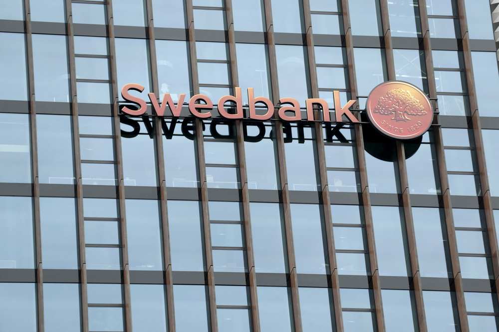 Swedbank's logo is pictured on its Lithuanian headquarters in Vilnius, Lithuania in this May 10, 2014 file photo. u00e2u20acu201d Reuters pic