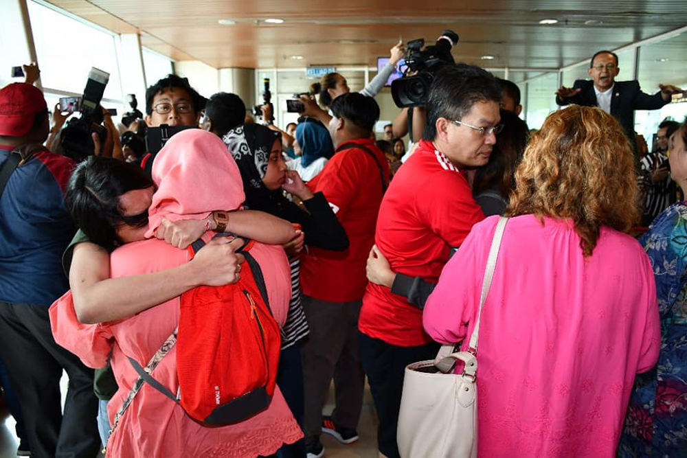 Some family members welcoming the ex-detainees upon arrival at the Kuching International Airport, February 17 2019. u00e2u20acu201d Picture courtesy of Unit Komunikasi Awam Sarawak (UKAS)