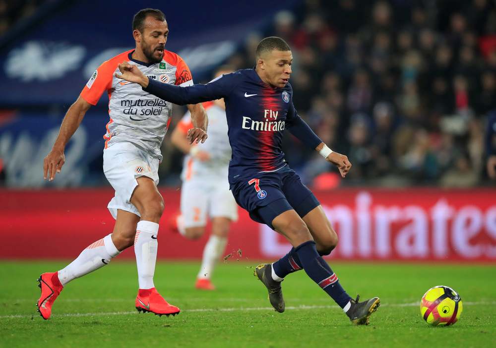 Paris St Germain's Kylian Mbappe (right) in French Ligue 1 action with Montpellier at Parc des Princes, Paris February 20, 2019. u00e2u20acu201d Reuters pic
