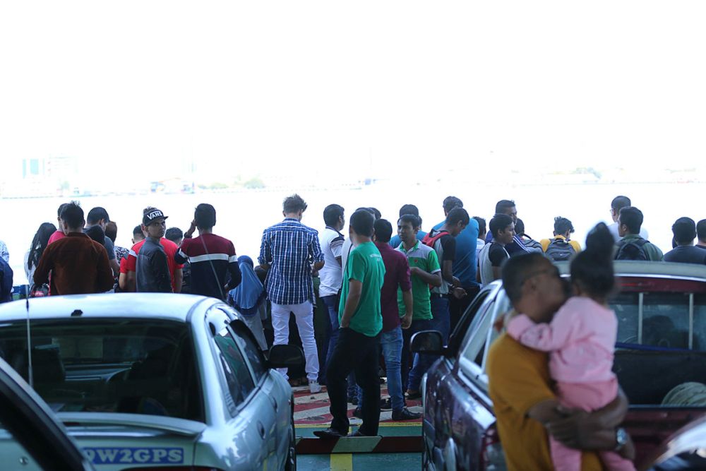 People are seen onboard a ferry bound for Penang island, February 7, 2019. u00e2u20acu2022 Picture by Sayuti Zainudin