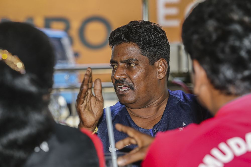 Hulu Langat PKR chief M. Puvenendran speaks to reporters about the Semenyih by-election.