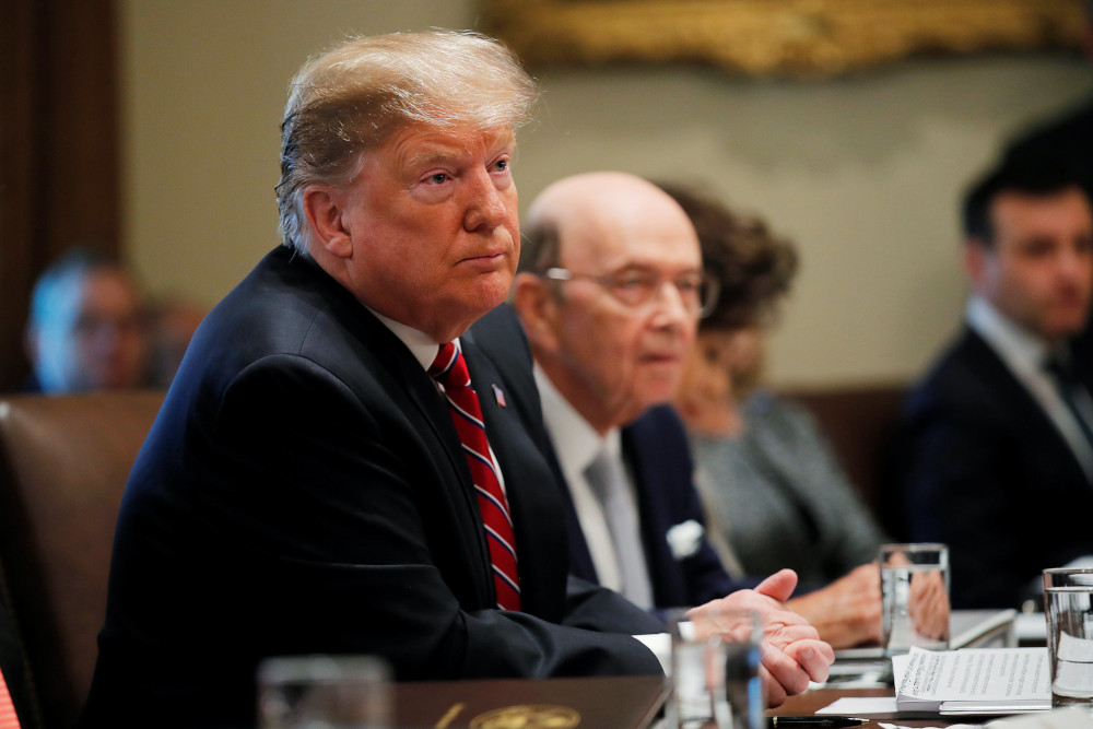 US President Donald Trump listens next to Commerce Secretary Wilbur Ross during a Cabinet meeting at the White House in Washington, February 12, 2019. u00e2u20acu201d Reuters pic 