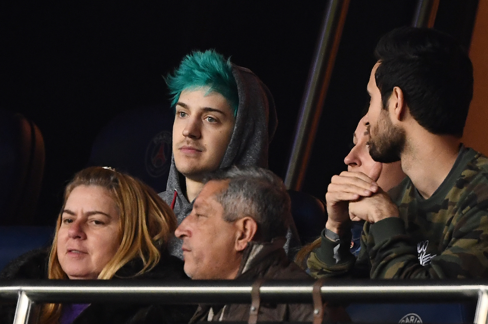 Tyler Blevins (centre), aka Ninja, attends the Uefa Champions League round of 16 second-leg football match between Paris Saint-Germain (PSG) and Manchester United in Paris March 6, 2019. u00e2u20acu201d AFP pic