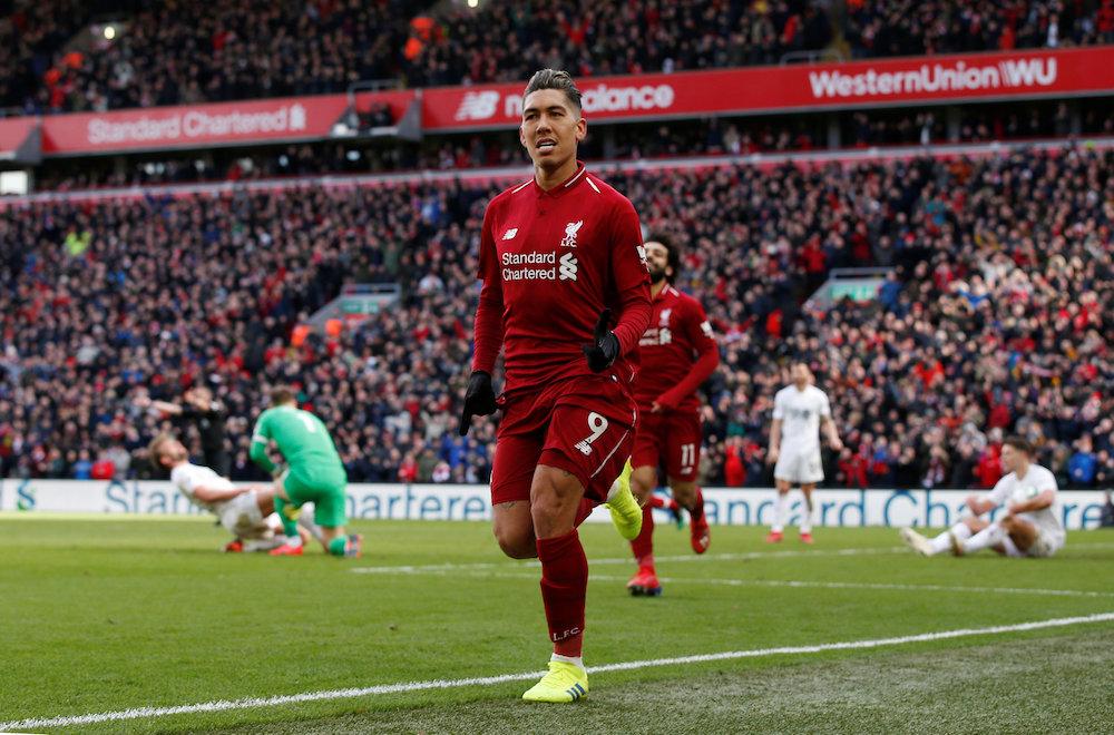Liverpool's Roberto Firmino celebrates scoring their third goal, March 10, 2019. u00e2u20acu201d Action Images handout via Reuters/Jason Cairnduff 