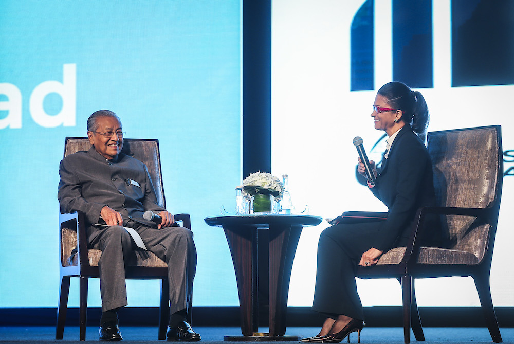 Prime Minister Tun Dr Mahathir Mohamad and Chairman of Bursa Malaysia Datuk Shireen Ann Zaharah Muhiudeen at the Invest Malaysia 2019 conference in Kuala Lumpur March 19, 2019. u00e2u20acu201d Picture by Firdaus Latif