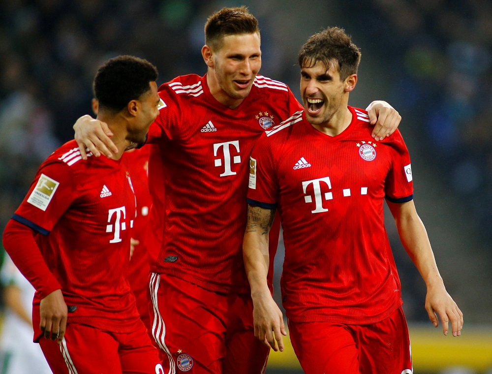 Bayern Munich's Javi Martinez celebrates scoring their first goal with team mates at the Borussia Park in Moenchengladbach, Germany  March 2, 2019. u00e2u20acu201d Reuters pic