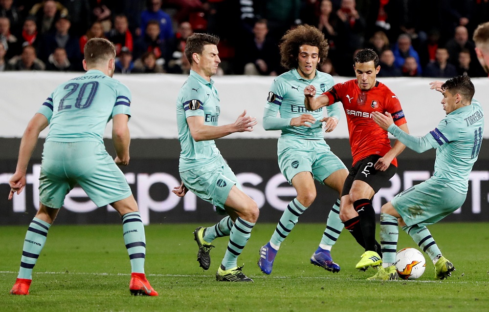 Stade Rennes' Mehdi Zeffane in action with Arsenal's Lucas Torreira, Matteo Guendouzi and Laurent Koscielny at Roazhon Park in Rennes March 7, 2019. u00e2u20acu201d Action Images via Reuters