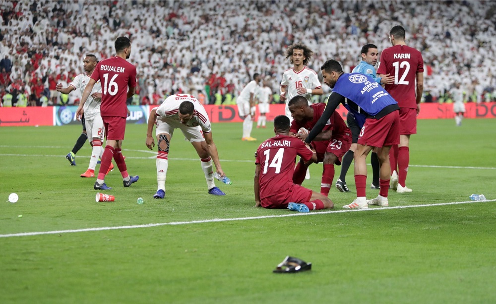 Qatar players celebrate after Hasan Al Haydos scored their third goal as objects are thrown onto the pitch at the Mohammed bin Zayed Stadium in Abu Dhabi January 29, 2019. u00e2u20acu201d Reuters pic