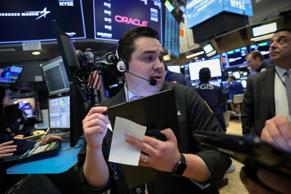 Traders work on the floor at the New York Stock Exchange March 13, 2019. u00e2u20acu201d Reuters pic