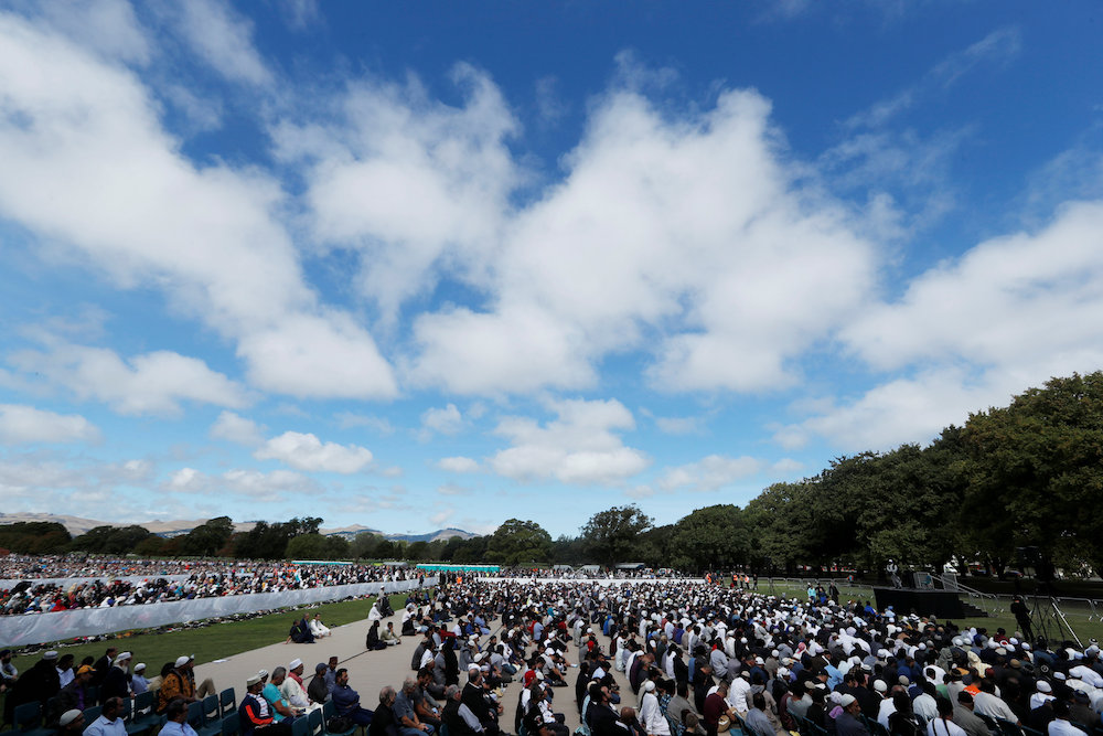 People attend the Friday prayers at Hagley Park outside Al-Noor mosque in Christchurch, New Zealand March 22, 2019. — Reuters pic
