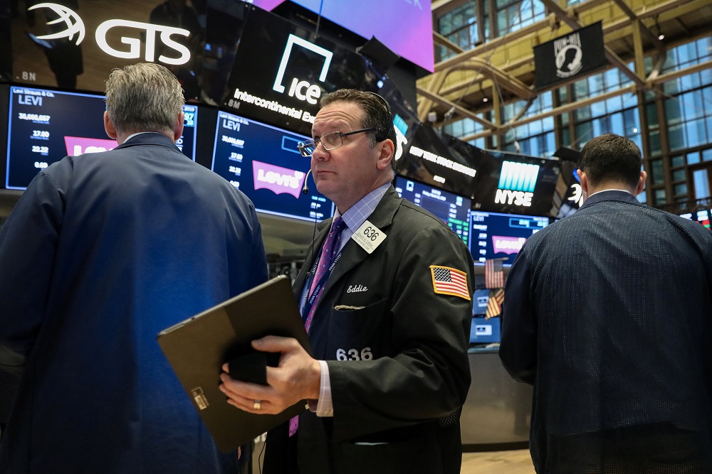 Traders work on the floor at the New York Stock Exchange March 22, 2019. u00e2u20acu201d Reuters pic