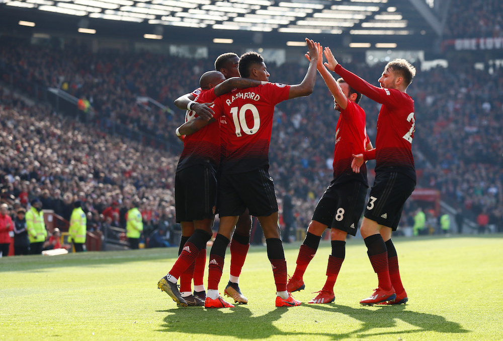 Manchester United’s Marcus Rashford celebrates scoring their first goal with team mates during their Premier League game with Watford at Old Trafford in Manchester March 30, 2019. — Action Images pic via Reuters