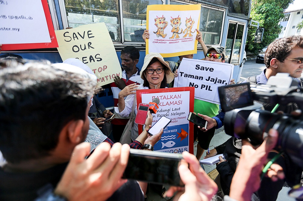 Penang Forum member Khoo Salma Nasution speaks to the press during a protest against the Penang South Reclamation project at Jalan Masjid Negeri in George Town March 1, 2019.