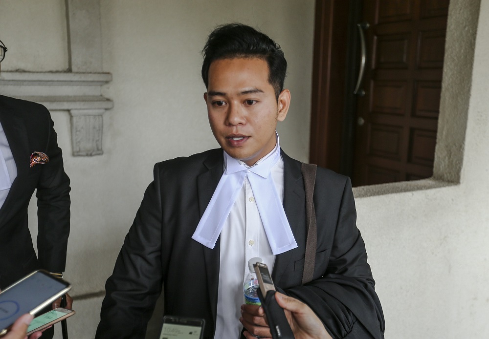 Federal Territories Minister Khalid Abdul Samadu00e2u20acu2122s lawyer, Muhammad Rafiqree Hamka, speaks to the media at the Kuala Lumpur Court Complex March 6, 2019. u00e2u20acu201d Picture by FIrdaus Latif 