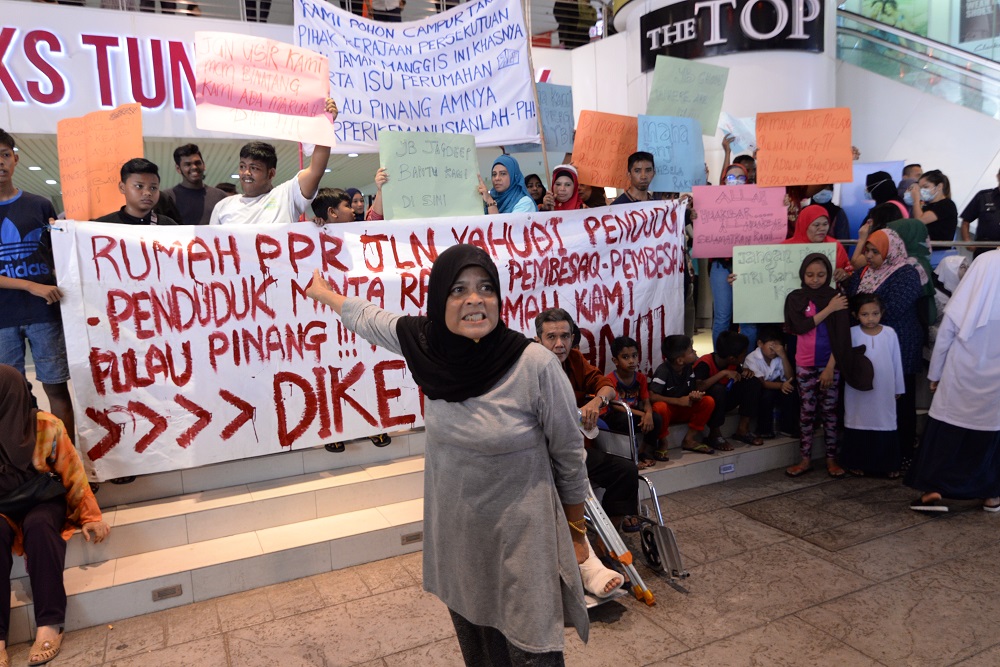 Protesters gather at the Komtar building during a demonstration against the eviction from their Taman Manggis PPR homes in George Town March 6, 2019. u00e2u20acu201d Picture by Steven Ooi KE