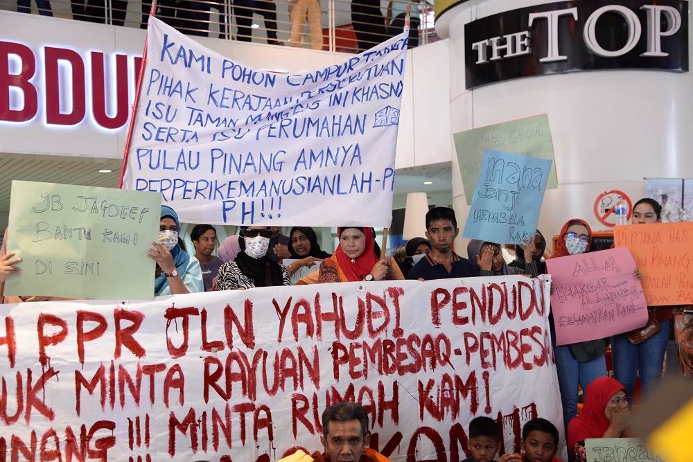 Protesters gather at the Komtar building during a demonstration against the eviction from their Taman Manggis PPR homes in George Town March 6, 2019. u00e2u20acu201d Picture by Steven Ooi KE