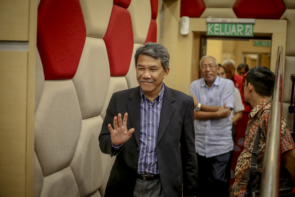 Datuk Seri Mohamad Hasan leaves after a press conference in Kuala Lumpur March 7, 2019. u00e2u20acu201d Picture by Firdaus Latif 