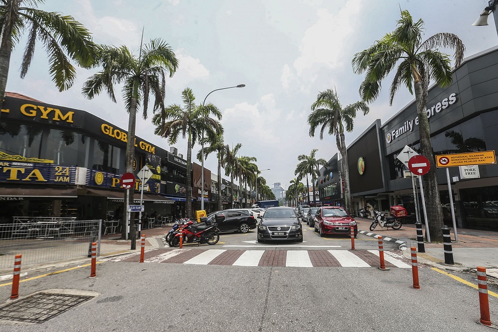 A view of shoplots in the fairly affluent neighbourhood of Bangsar, which Oh Ei Sun notes is famous as a hangout for 'liberals' but may not necessarily be where they live or own rental property. — Picture by Hari Anggara