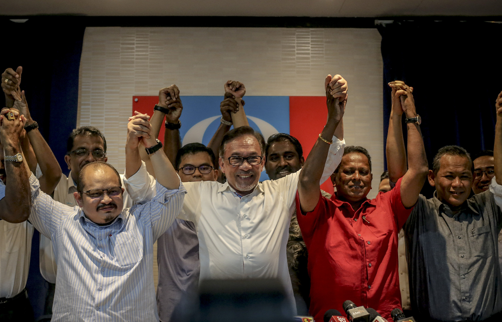 PKR president Datuk Seri Anwar Ibrahim with PKR candidate Dr Streram Sinnasamy for Rantau by-election (2nd right) during a press conference in Petaling Jaya March 11, 2019. u00e2u20acu201d Picture by Firdaus Latif