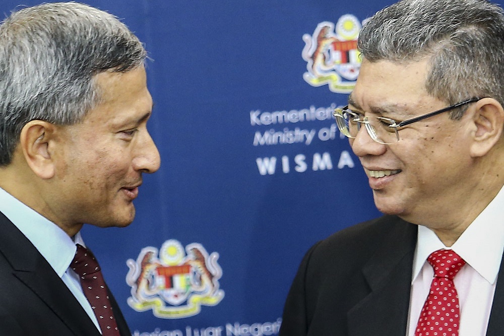 Foreign Minister Datuk Saifuddin Abdullah (right) with Singapore Foreign Affairs Minister Vivian Balakrishnan at a press conference at Wisma Putra, Putrajaya March 14, 2019. — Picture by Hari Anggara