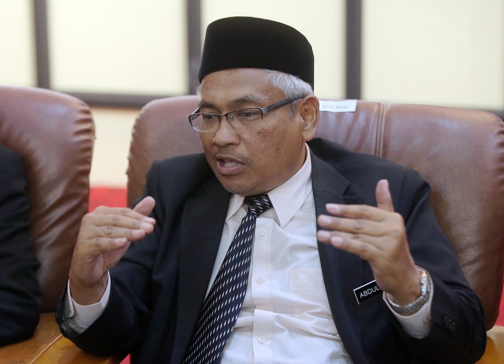 Perak DAP deputy chairman Abdul Aziz Bari speaks to reporters during a press conference in Ipoh March 18, 2019. u00e2u20acu201d Picture by Farhan Najib