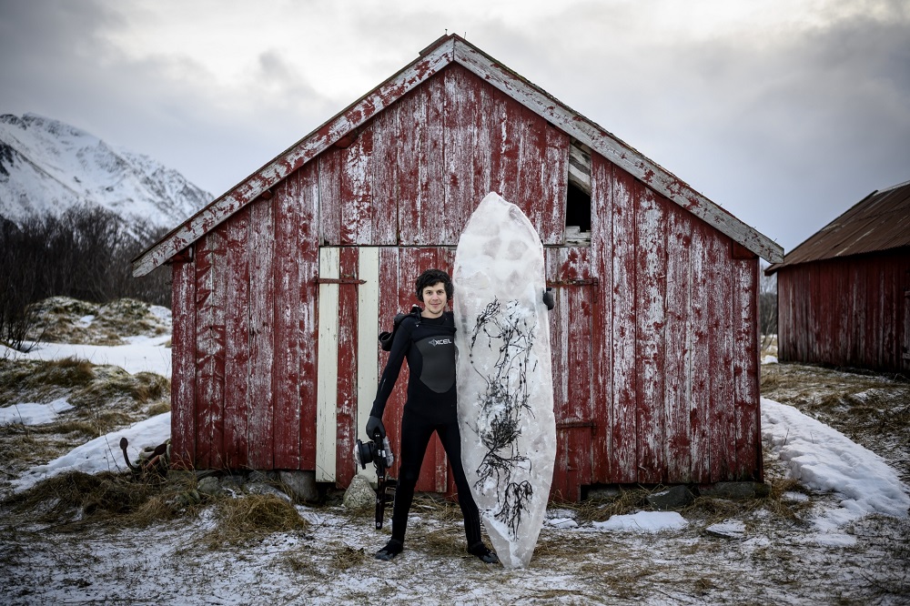 Norwayu00e2u20acu2122s Inge Tamburaci Wegge, 32, head of the Iceboard project, poses with a surfboard made of ice. u00e2u20acu201d AFP