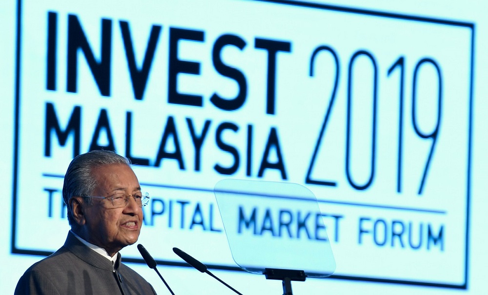 Prime Minister Tun Dr Mahathir Mohamad delivers his keynote speech at Invest Malaysia 2019 in Kuala Lumpur March 19, 2019. u00e2u20acu201d Bernama pic