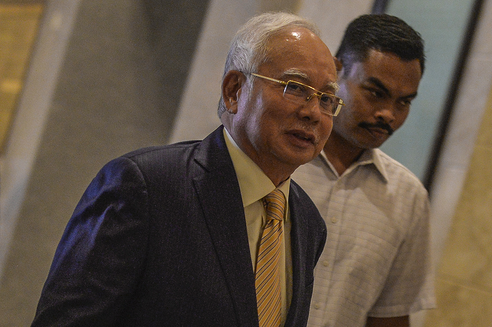 Datuk Seri Najib Razak is pictured leaving the Putrajaya High Court March 21, 2019. u00e2u20acu201d Picture by Miera Zulyana