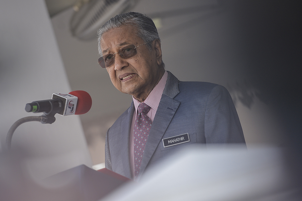 Prime Minister Tun Dr Mahathir Mohamad addresses the 212th Police Day Parade at the Police Training Centre (Pulapol) in Kuala Lumpur March 25, 2019. u00e2u20acu201d Picture by Miera Zulyana