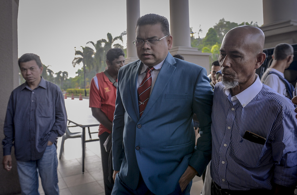 Datuk Lokman Noor Adam arrives at the Kuala Lumpur Court Complex March 28, 2019. u00e2u20acu201d Picture by Firdaus Latif