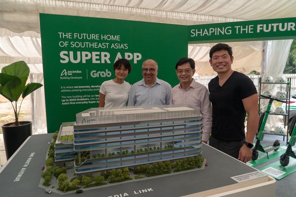 (From left) Grab co-founder Tan Hooi Ling, Ascendas-Singbridge chief executive Manohar Khiatani, Finance Minister Heng Swee Keat and Grab chief executive officer Anthony Tan, with a 3D model of Grabu00e2u20acu2122s new headquarters. u00e2u20acu201d TODAY pic