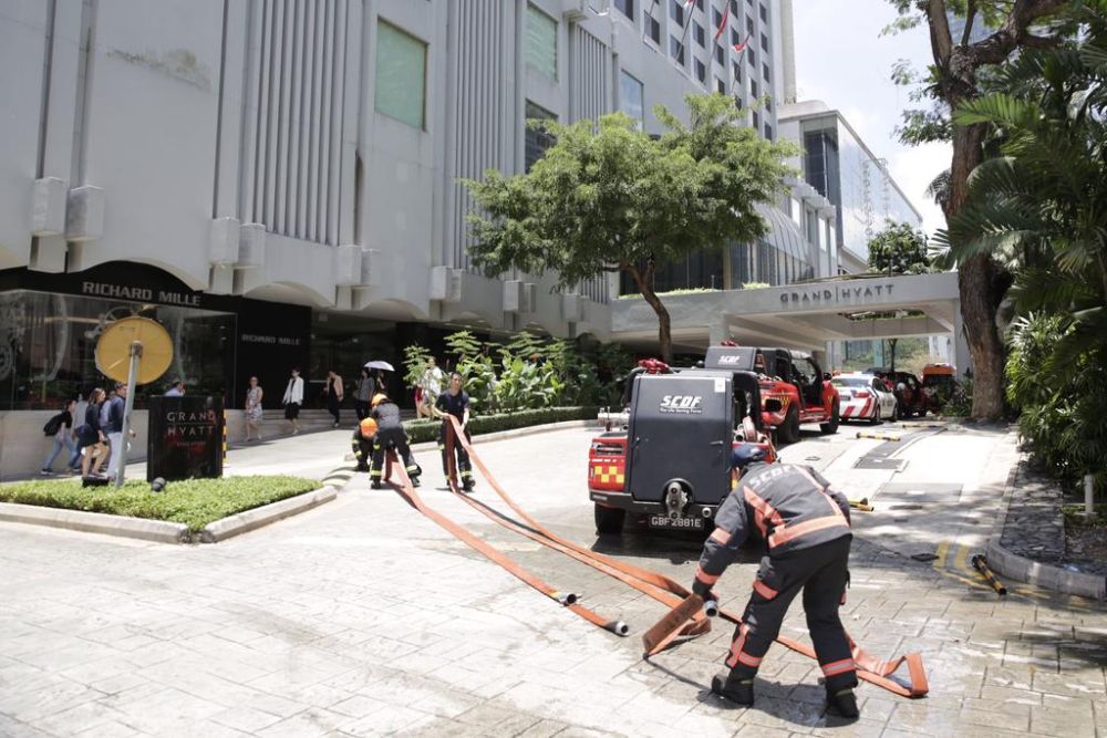 Fire fighters seen at Grand Hyatt hotel along Orchard Road March 27, 2019. The fire broke out at the second floor of the hotel. u00e2u20acu201d TODAY pic