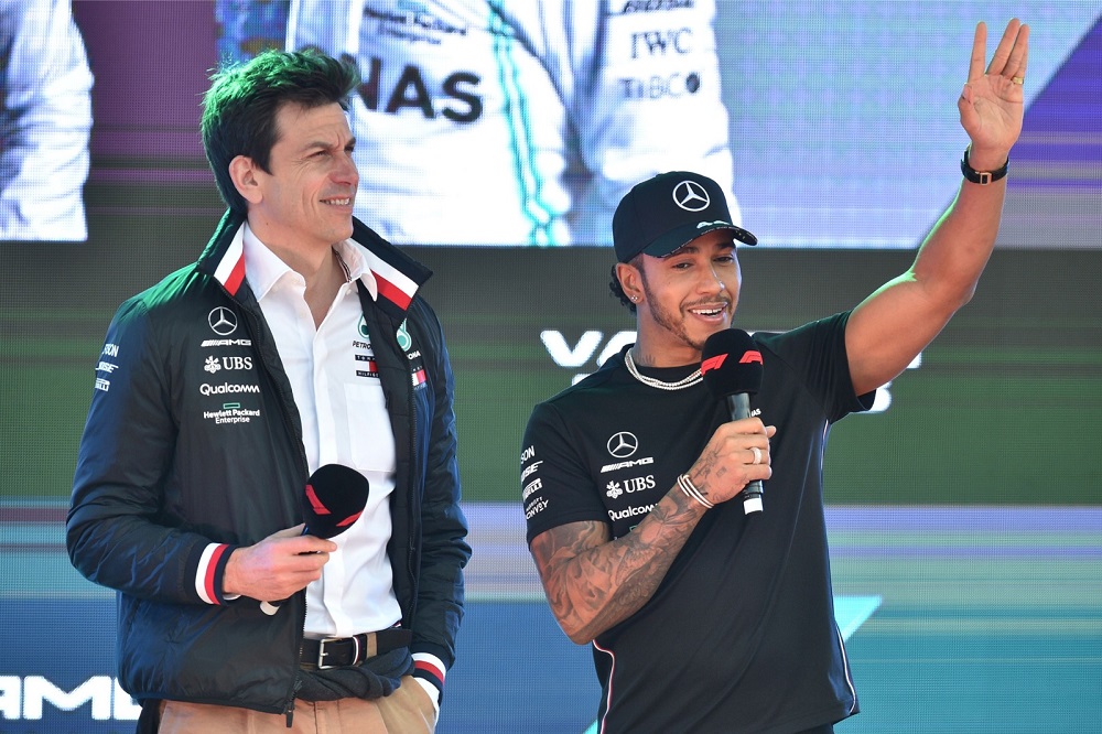 Mercedesu00e2u20acu2122 British driver Lewis Hamilton (right) and team principal Toto Wolff (left) greet fans onstage during an F1 live event to introduce drivers and team principals in Melbourne March 13, 2019. u00e2u20acu201d AFP pic