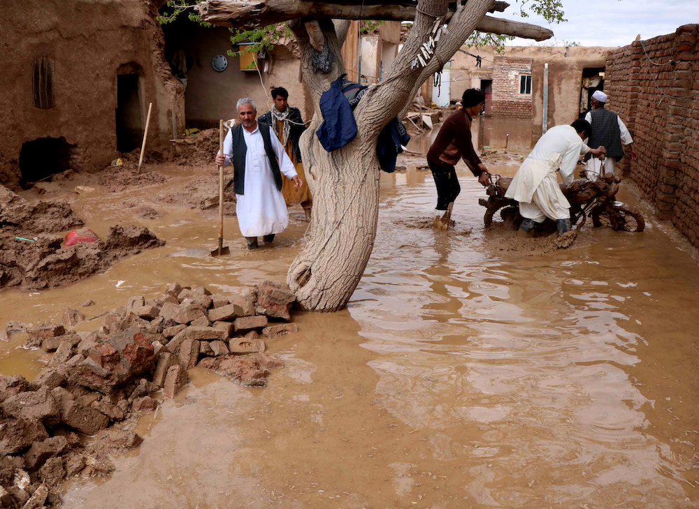 People salvage items from a house destroyed by flood in Enjil district of Herat province, Afghanistan March 29, 2019. Picture taken March 29, 2019. u00e2u20acu201d Reuters pic