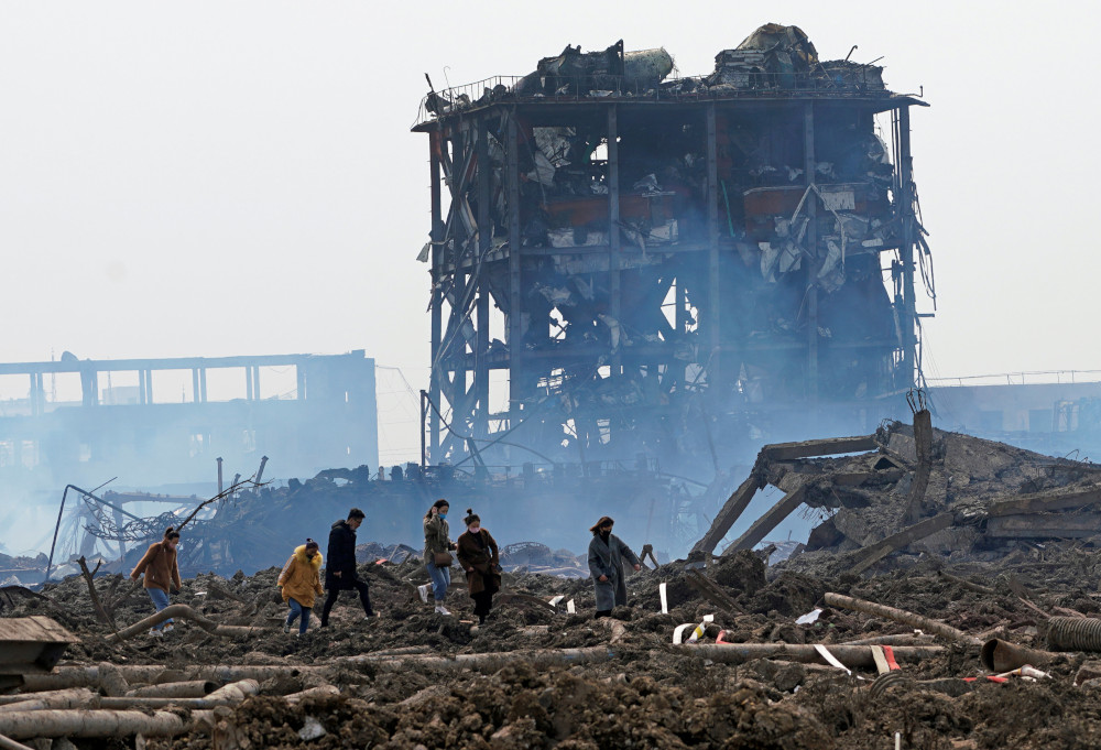 Relatives look for a missing worker at the pesticide plant owned by Tianjiayi Chemical following an explosion, in Xiangshui county, Yancheng, Jiangsu province, China March 23, 2019. u00e2u20acu201d Reuters pic 