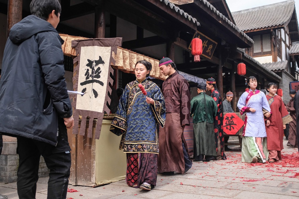 This photo taken on January 30, 2019 shows extras dressed in period costume walking on set during filming for a Chinese TV drama at Hengdian World Studios in Dongyang in Chinau00e2u20acu2122s eastern Zhejiang province. u00e2u20acu201d AFP pic  