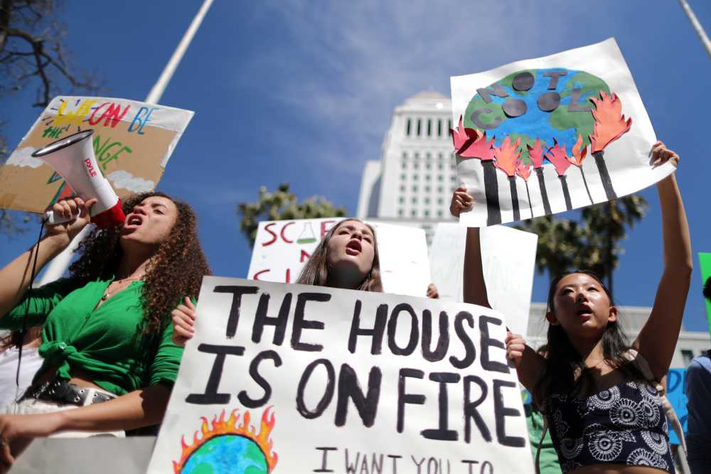 Students attend a protest rally to call for urgent action to slow the pace of climate change, in Los Angeles March 15, 2019. u00e2u20acu2022 Reuters pic