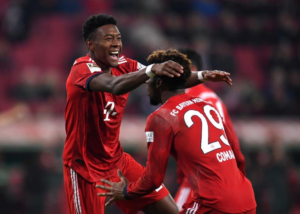Bayern Munichu00e2u20acu2122s David Alaba celebrates scoring their third goal with Kingsley Coman against FC Augsburg during their Bundesliga match in WWK Arena, Augsburg, February 15, 2019. u00e2u20acu201d Reuters pic