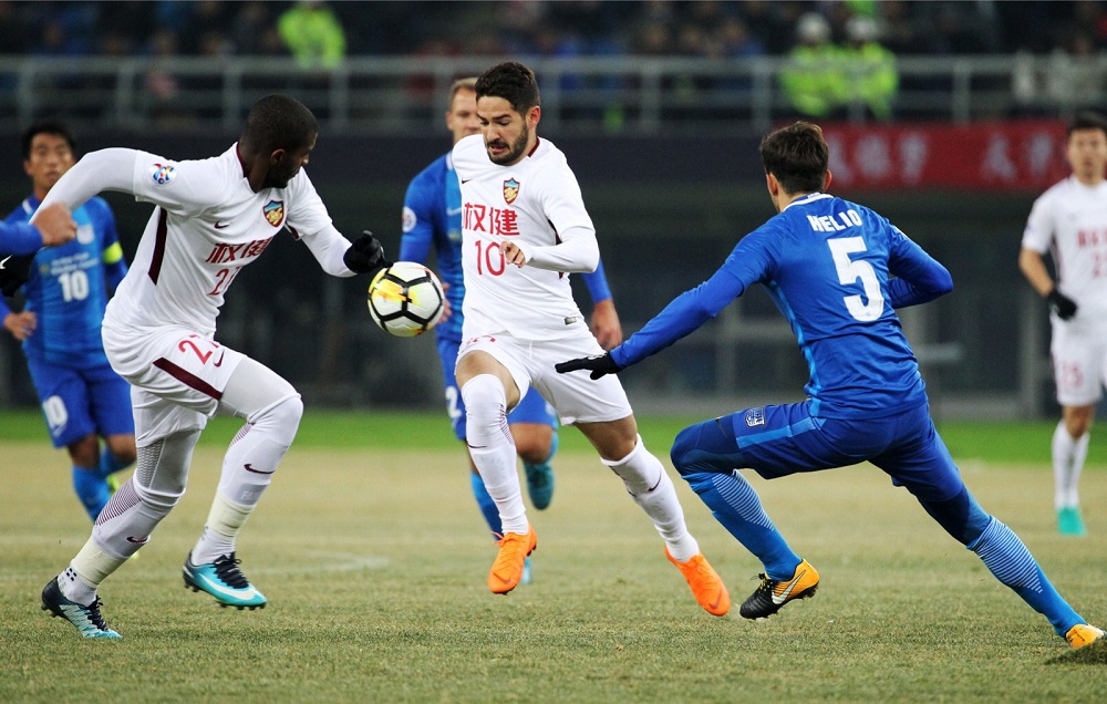 Alexandre Pato (centre) of Tianjin Quanjian and teammate Anthony Modeste (left) compete for the ball with Helio (right) of Kitchee SC during their AFC Champions League group stage football match in Tianjin February 13, 2018. u00e2u20acu201d AFP pic