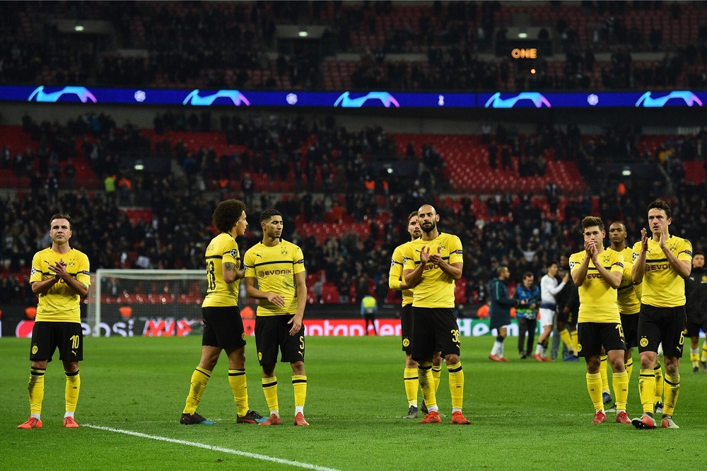 Borussia Dortmund's players applaud their supporters on the pitch after the Uefa Champions League match against Tottenham Hotspur at Wembley Stadium in London February 13, 2019. u00e2u20acu201d AFP pic