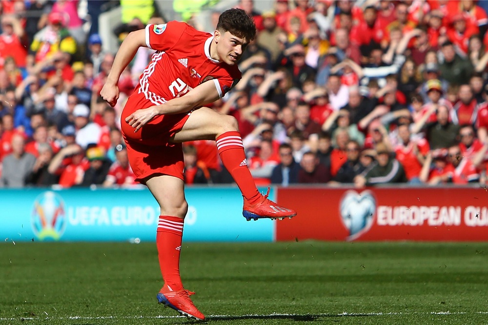 Wales' midfielder Daniel James shoots to score their early opening goal during the UEFA Euro 2020 Group E qualification football match between Wales and Slovakia at Cardiff City Stadium in Cardiff March 24, 2019. u00e2u20acu201d AFP pic