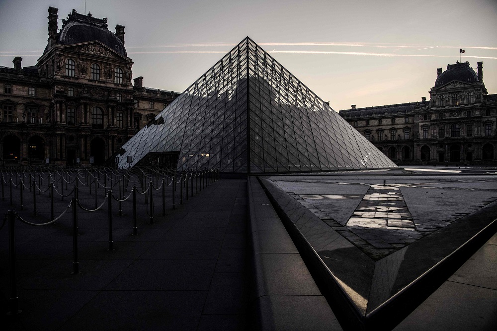 The Louvre museum pyramid is pictured at dawn in Paris March 22, 2019. Chinese born US architect Ieoh Ming Peiu00e2u20acu2122s pyramid celebrates its 30th anniversary this month. u00e2u20acu2022 AFP pic